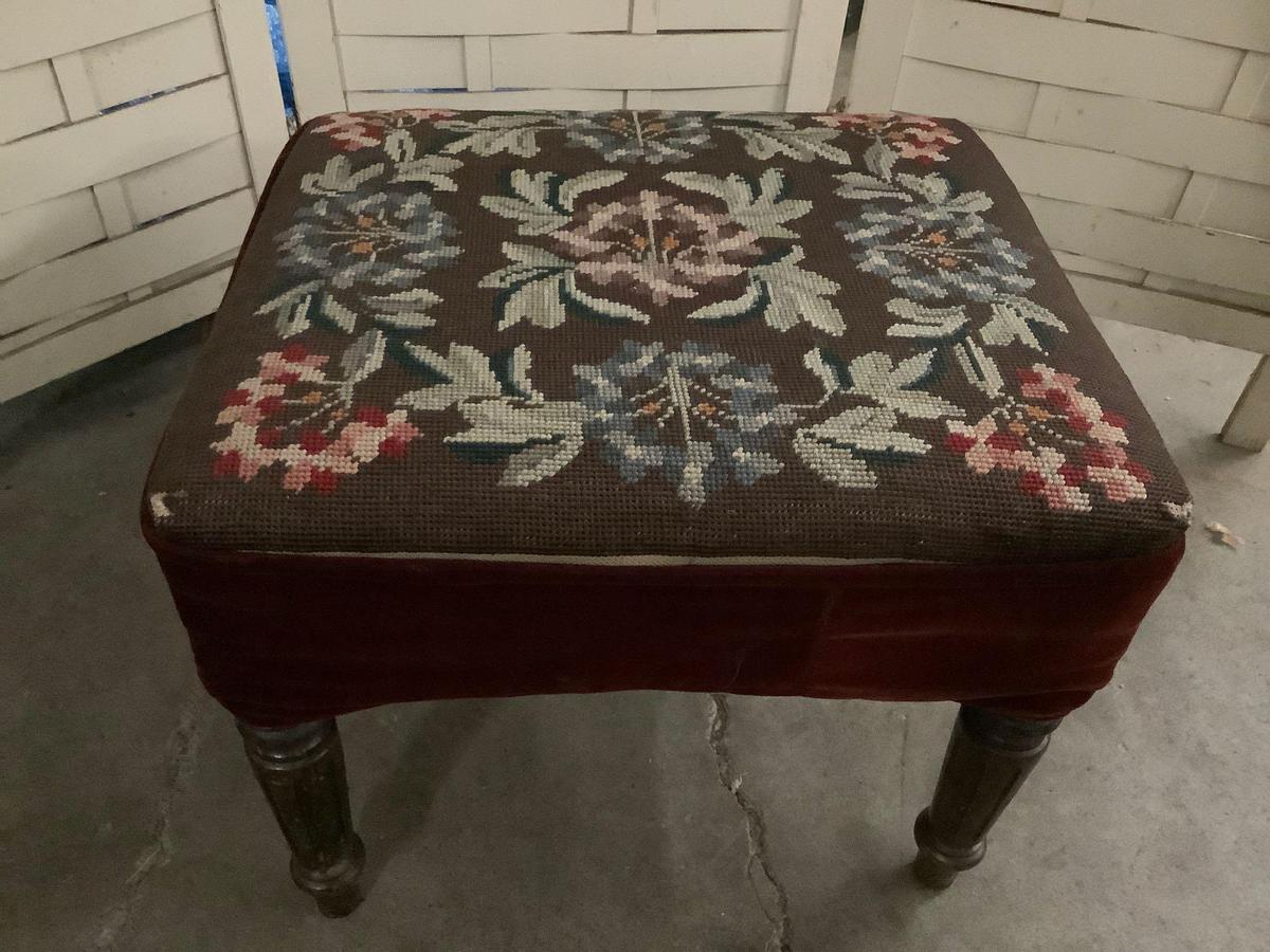 Vintage ottoman with wood carved legs and crocheted floral design upholstery 17x16x14 inches