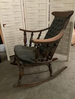 Antique wood carved rocking chair w/ leather seat and back, shows wear, 28 x 35 x 35 inches