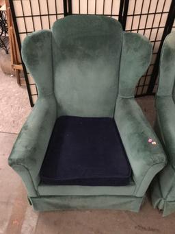 Pair of green and blue upholstered arm chairs.