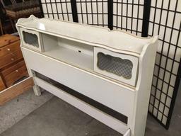 Full bed frame with cabinet head board.