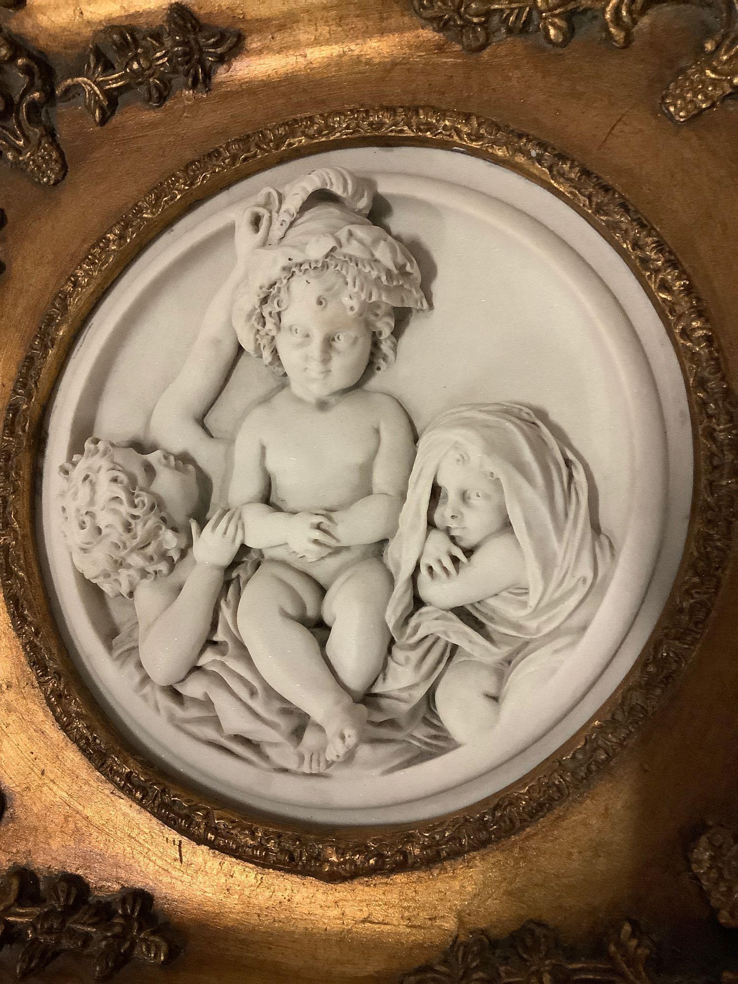 Antique gilt framed cherub relief marble art. Enrico Braga cherub plaque w/ Perfugium Regibus coin