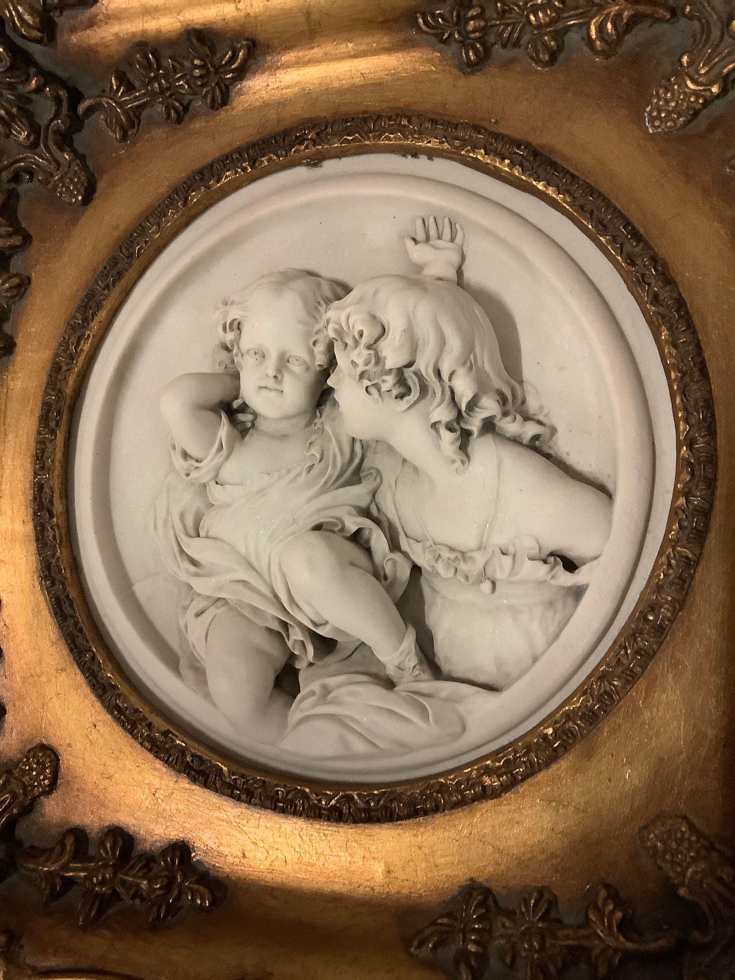 Antique gilt framed cherub relief marble art. Enrico Braga cherub plaque w/ Perfugium Regibus coin