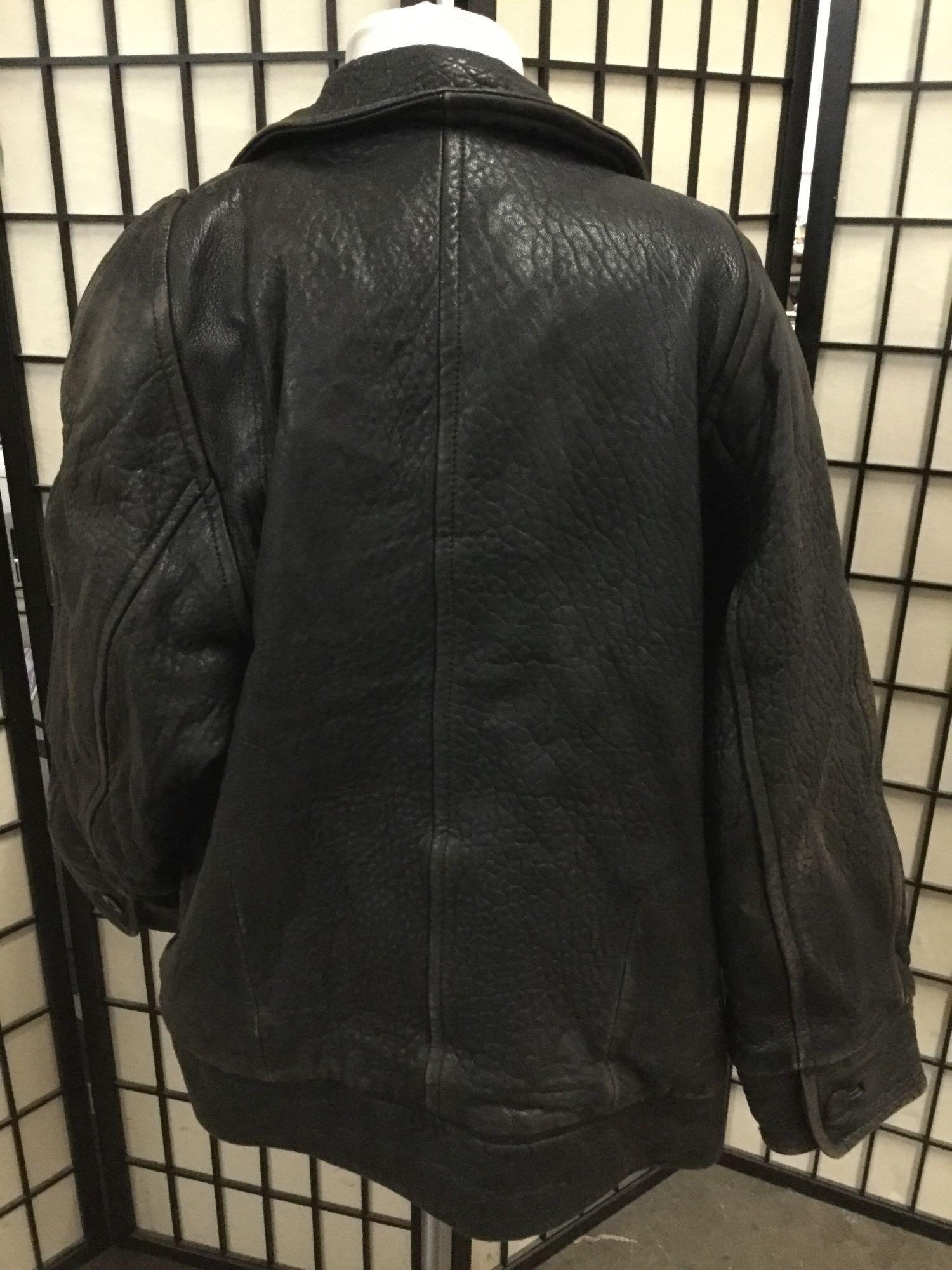 J and R leather jacket made in Korea approx size Large 28 x 20 inches.