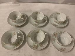 Set of 12 pieces of Royal Q and EG - Austrian porcelain tea cup and saucer sets, minor chips