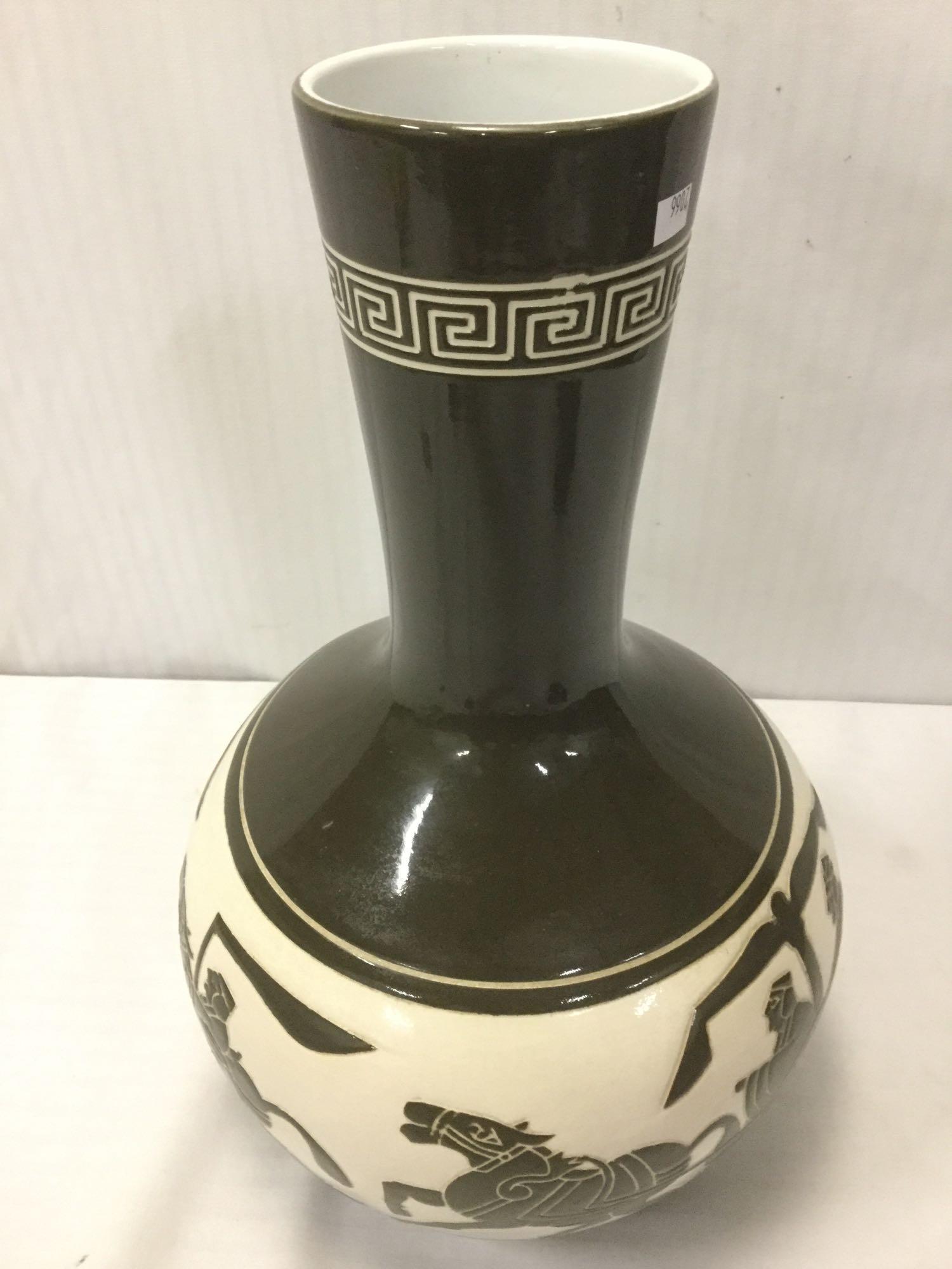 Mid-Century vintage Taiwanese black & white ceramic vase w/relief rider designs approx. 18x12x12 in.