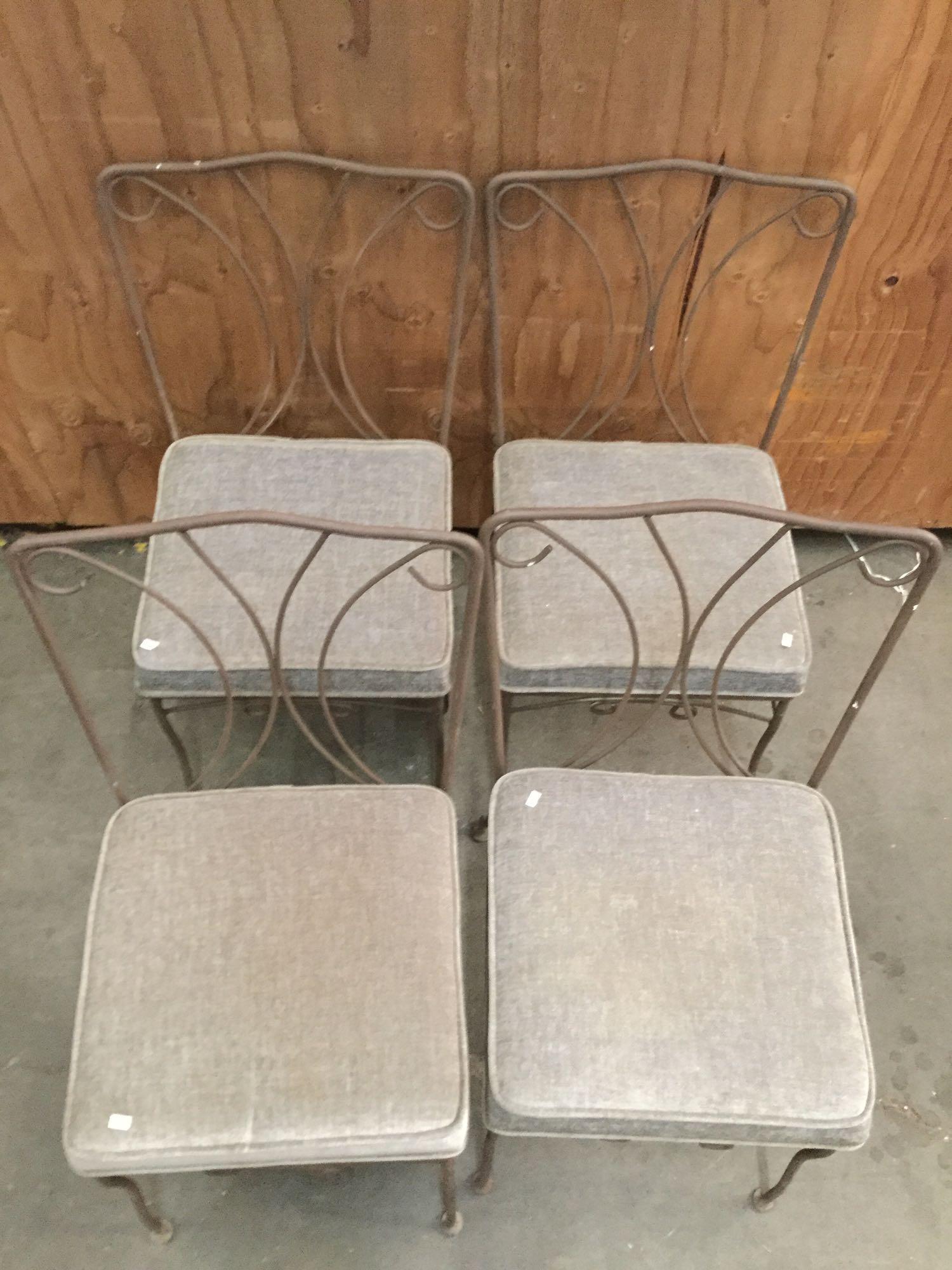 Set of 4 metal frame upholstered dining chairs. Approx 33x23x19 inches.
