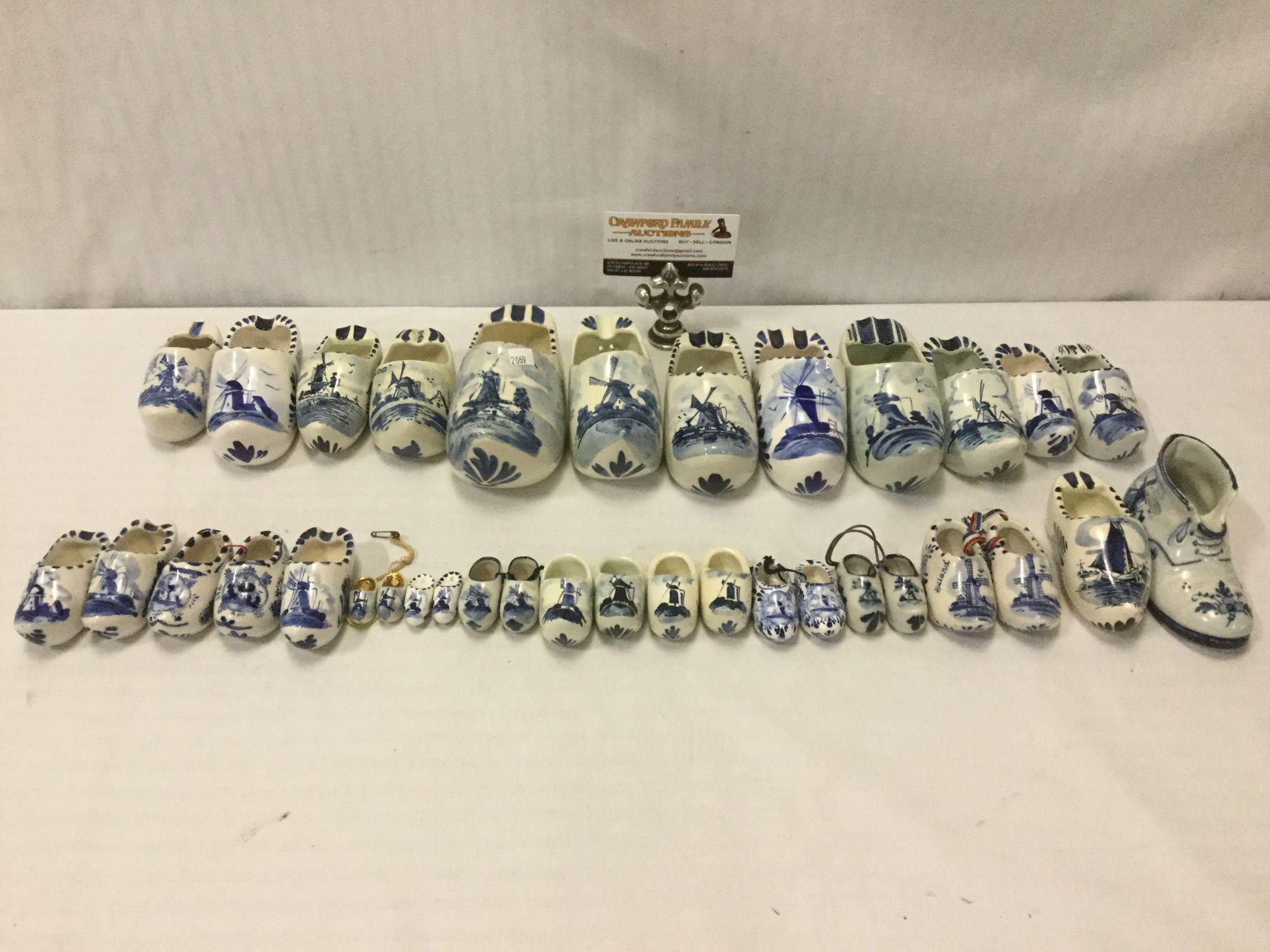 35 vintage hand-painted Dutch Delft Blue China clogs & 1 boot, many are matching pairs.