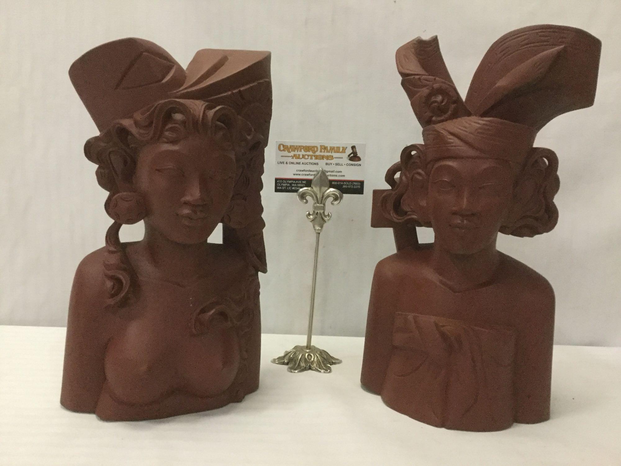 Pair of 1976 vintage Indonesian wooden busts of women from Bali, approx. 13x7x4 inches.