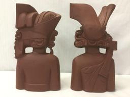 Pair of 1976 vintage Indonesian wooden busts of women from Bali, approx. 13x7x4 inches.