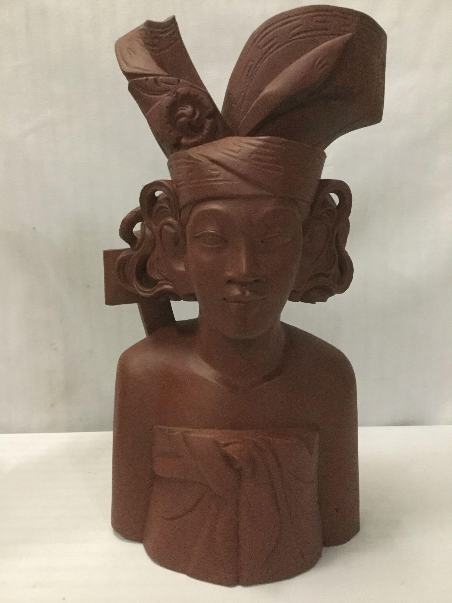 Pair of 1976 vintage Indonesian wooden busts of women from Bali, approx. 13x7x4 inches.