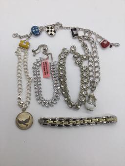 Lot of charm bracelets and estate jewelry bracelet.