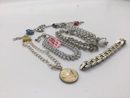 Lot of charm bracelets and estate jewelry bracelet.