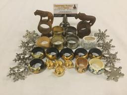 napkin rings / holders. Wood, metal, & ceramic. Snowflakes, animals, buildings