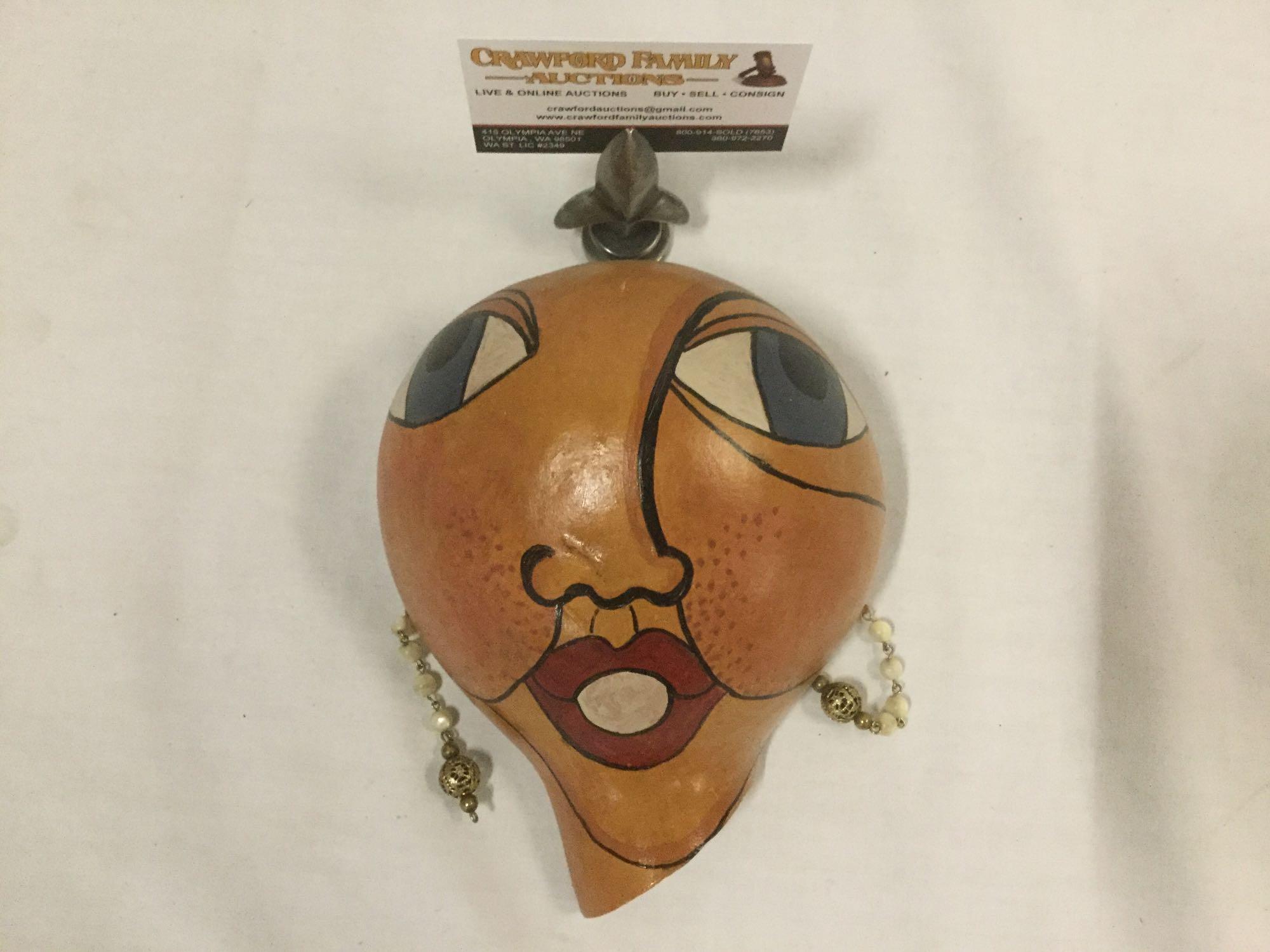 Wall hanging painted woman?s face on gourd folk art piece