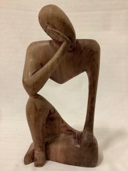 Wood carved African figure, The Thinker, Ebony wood, made in Ghana.