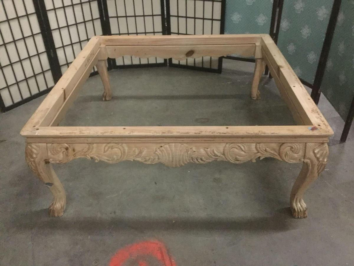 Wood carved clawfoot coffee table, missing top piece, sold as is