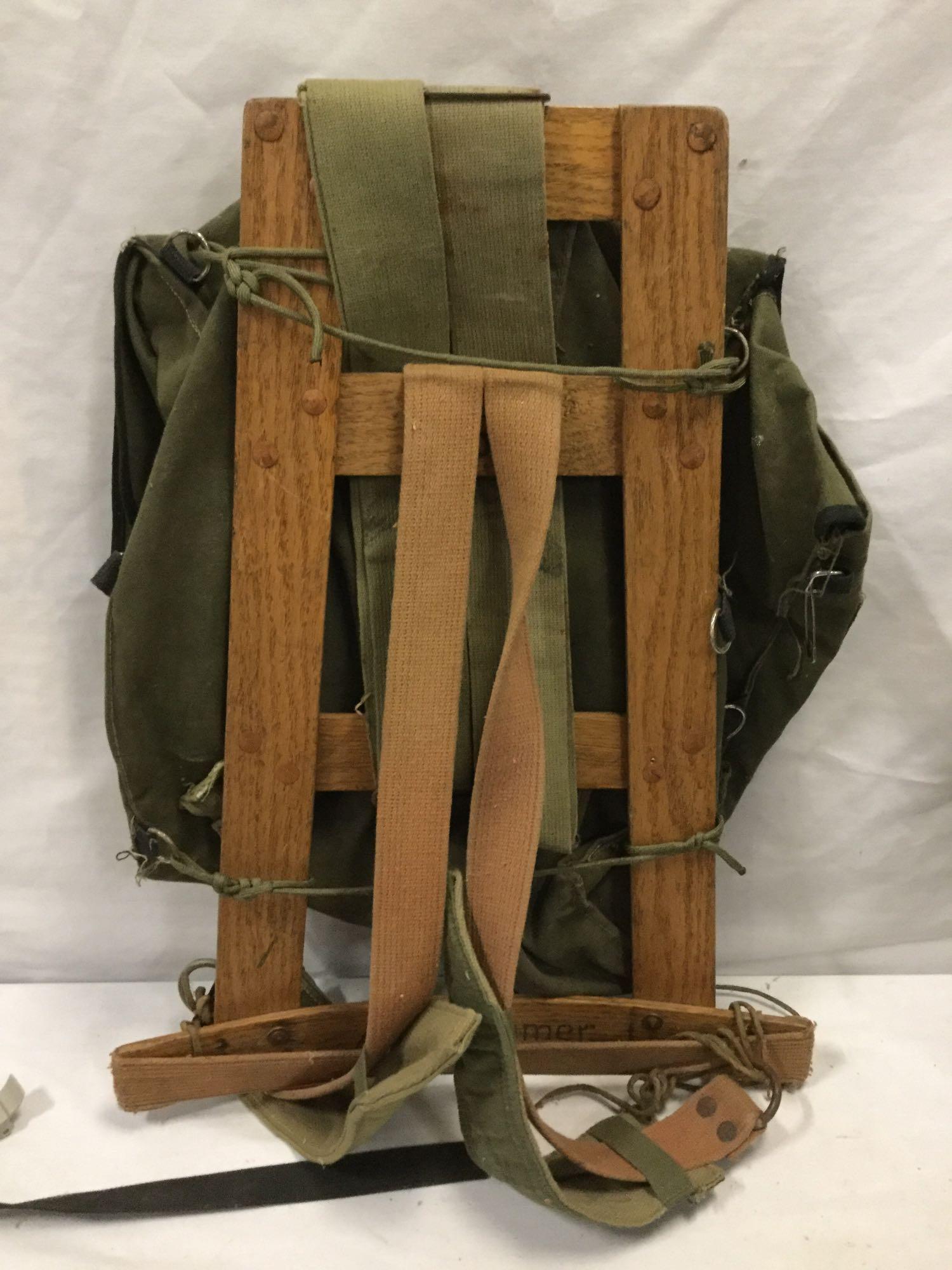 Collection of vintage camping gear incl. REI hip bag, framed backpack and more