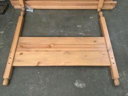 Full size oak bed frame with headboard and rails, approximately 57x52x76 in