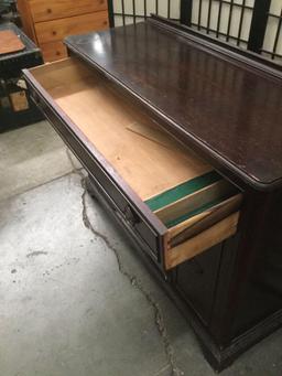 Vintage wooden buffet, shows surface wear, approximately 48x18x37 inches.