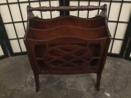 Vintage wood carved media rack with detailed wood cut design