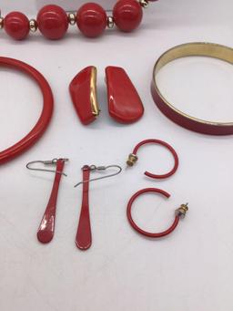 Collection of red and gold tone estate jewelry pieces
