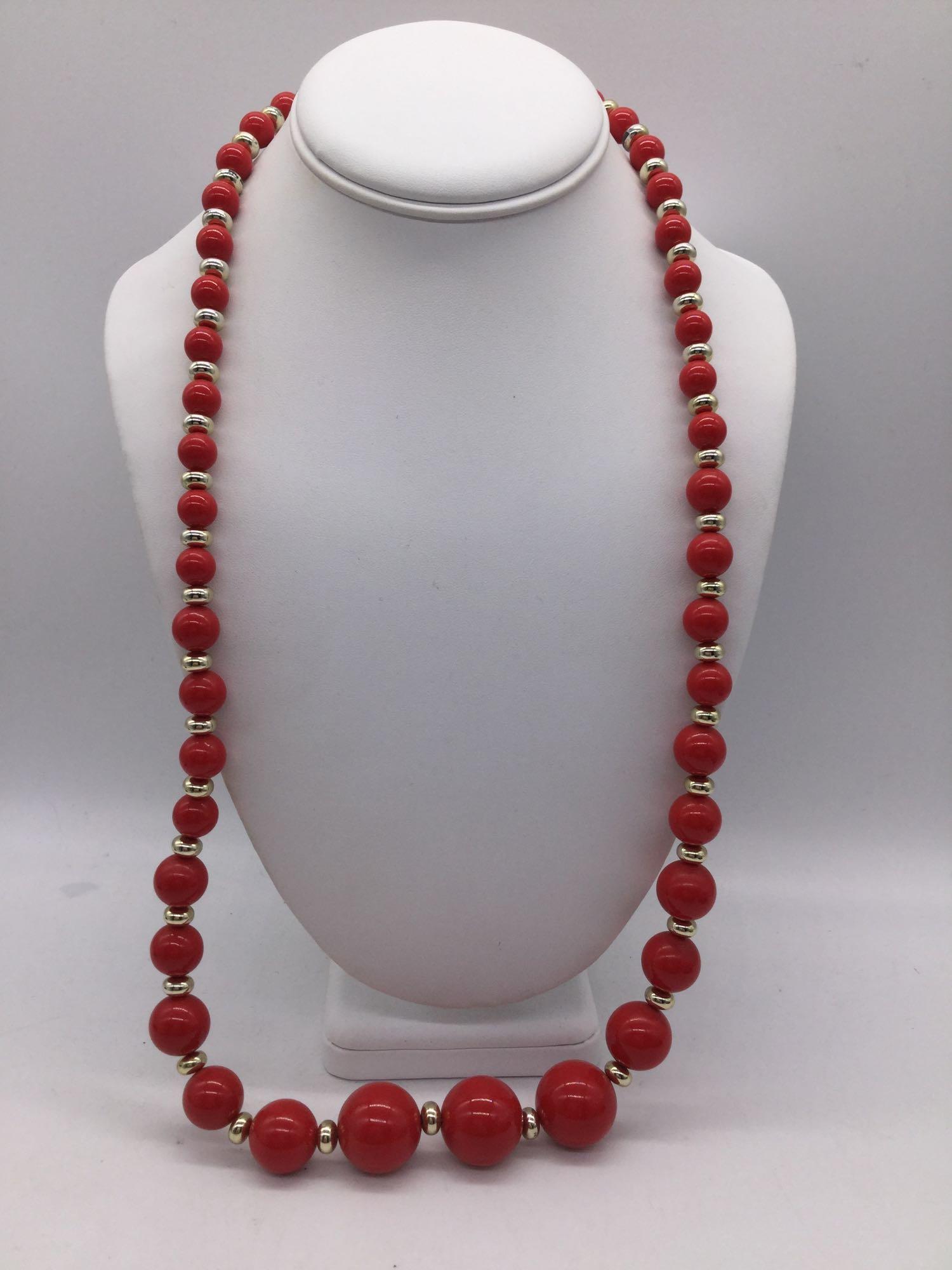 Collection of red and gold tone estate jewelry pieces