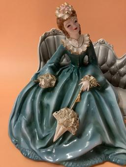 Vintage lace porcelain figure, woman on couch - Elizabeth by Florence Ceramics (California), approx.