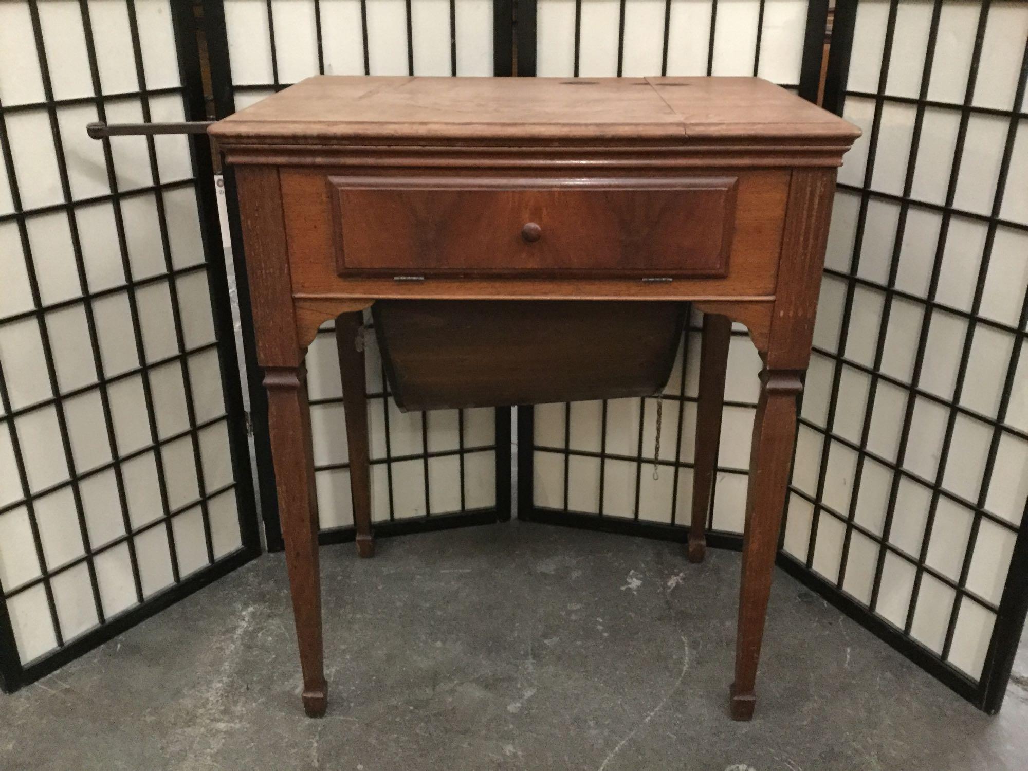 Vintage maple sewing cabinet with no machine, worn top - sold as is