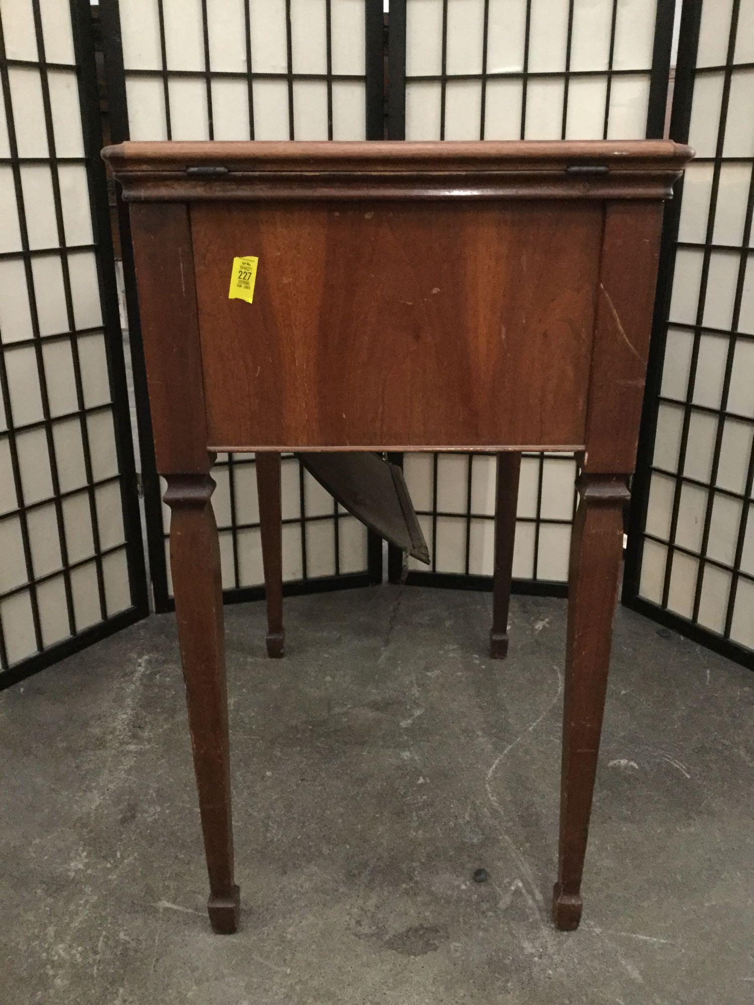 Vintage maple sewing cabinet with no machine, worn top - sold as is