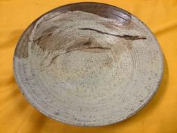 Handmade Native American stoneware bowl, signed by artist, approx 12 x 3 in.