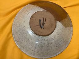 Handmade Native American stoneware bowl, signed by artist, approx 12 x 3 in.