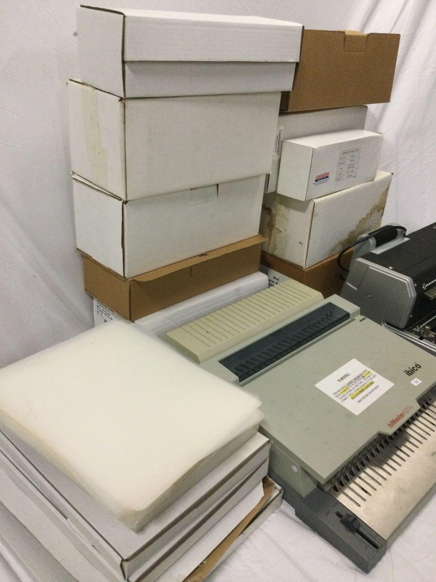 Lot of office spiral book binding machines w/ huge collection of spirals, laminate paper.