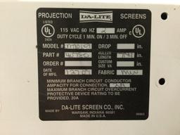 Da-Lite Projection Screens , cord has been cut, sold as is, approx 78 x 6 x 5 in.