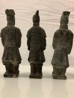 7 pc. lot of Chinese emperor stoneware figures. Sold as is.