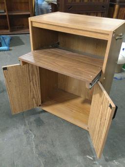 Rolling cabinet w/ extending shelf, approx 24 x 15 x 33 in.