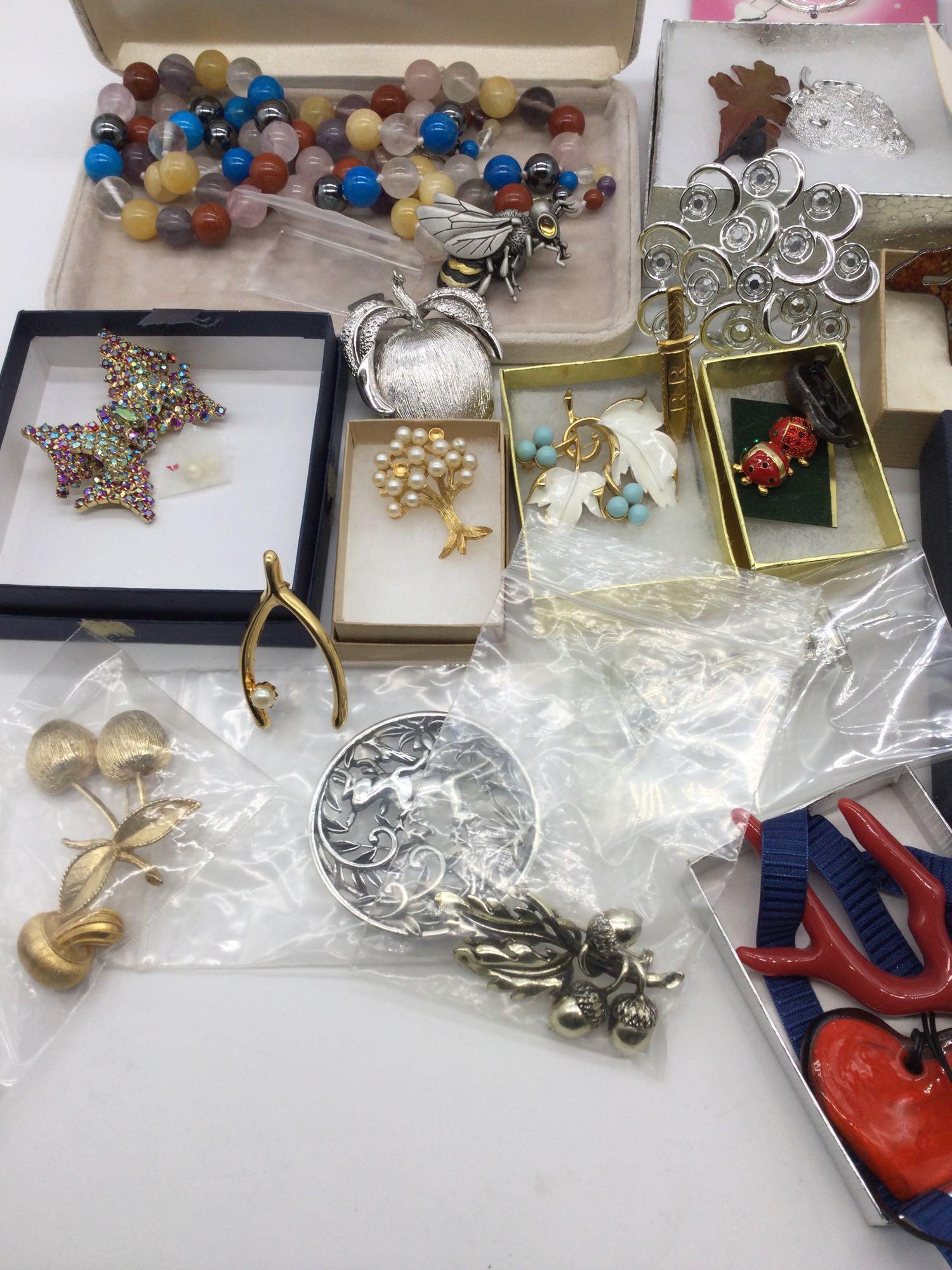 Large selection of fashion jewelry nice lot some signed pieces Trifari etc..