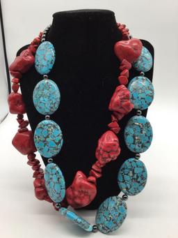 Large chunk style coral ? Necklace and a polished oval turquoise necklace