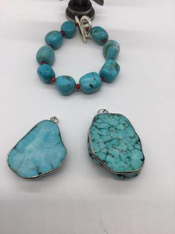 2 large turquoise ? nugget pendants and a turquoise bracelet