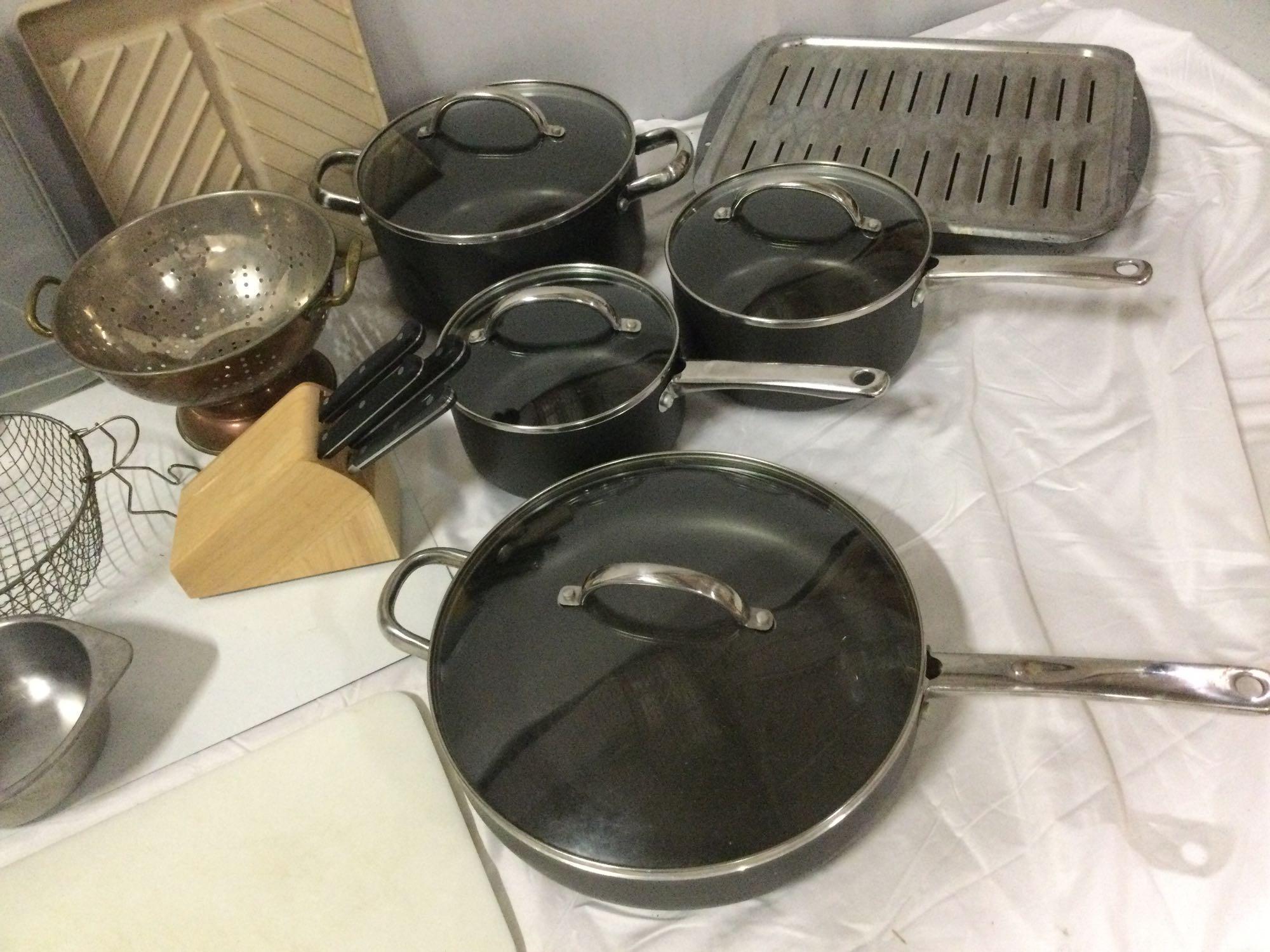 Huge lot of kitchen pots / pans/ enamel broilers/ cook books/ strainers/ knife set+, good used