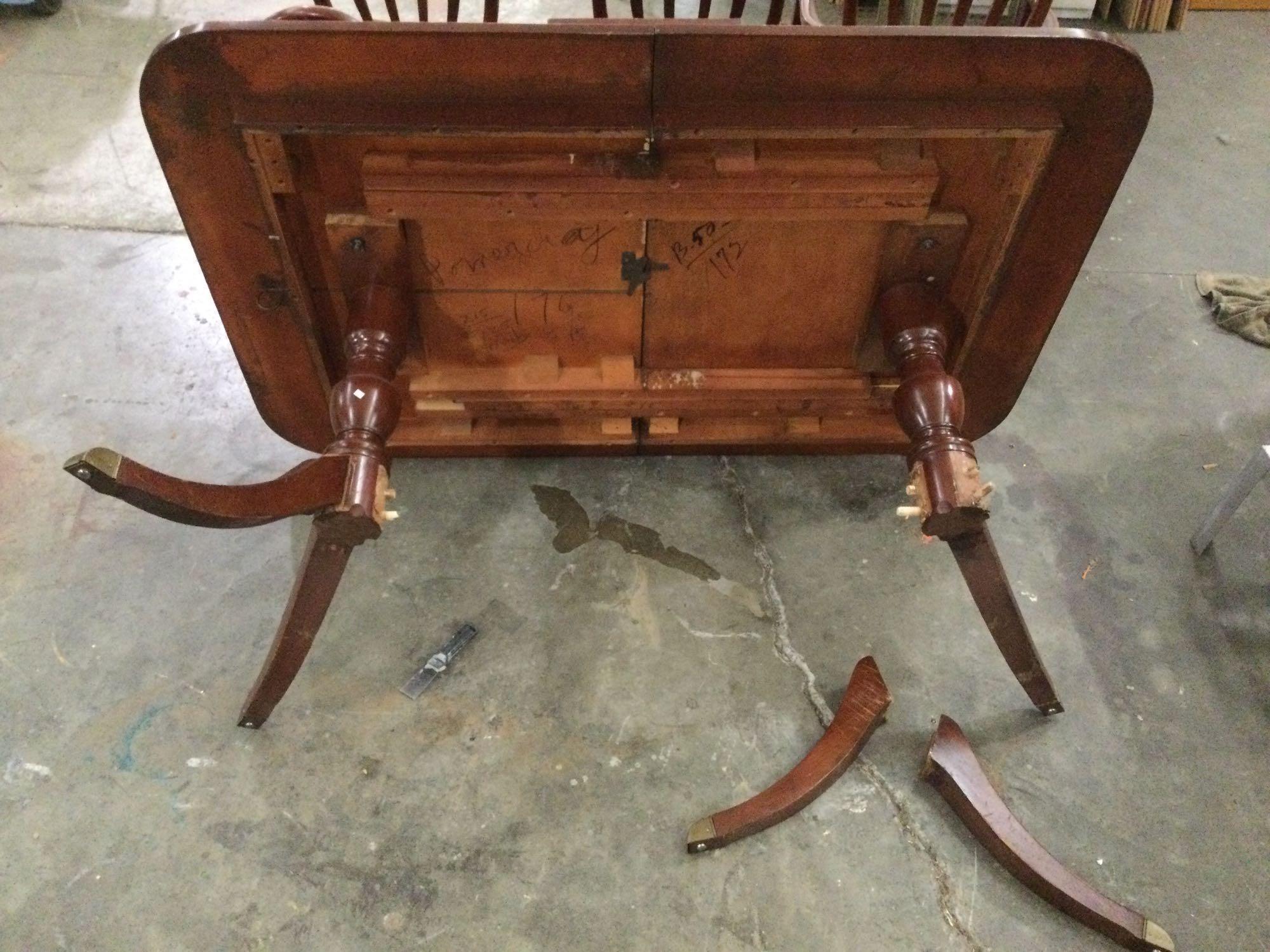 Vintage dining room set: cherry wood table w/ 1 leaf (needs legs glued), 6 chairs, sold as is.
