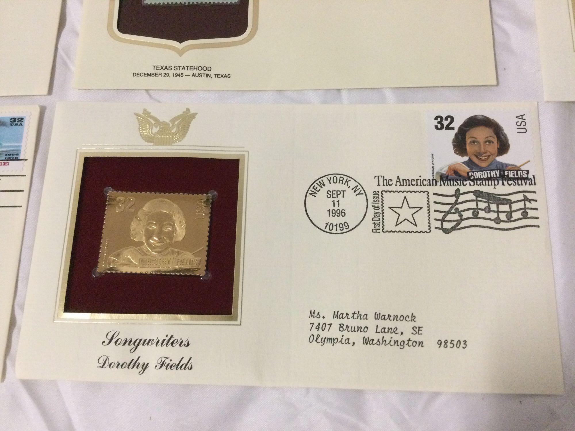 10 pc. lot of 1996 USA First Day of Issue / gold foil replica stamps w/ envelopes.