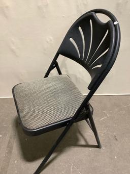 Sudden Comfort folding chair with upholstered seat and plastic back. INV 2212