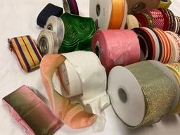 Nice lot of vintage ribbon/ trim spools, many styles/colors/patterns. see pics.