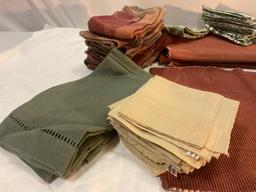 Nice collection of linen napkins /placemats, many styles.