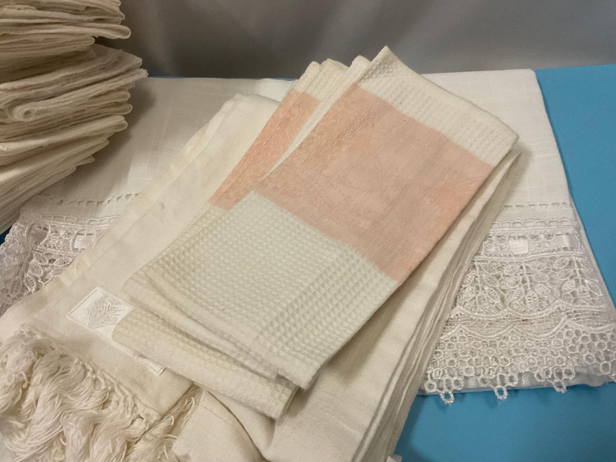 Large lot of antique linens, French linen tablecloths, many styles, see pics.