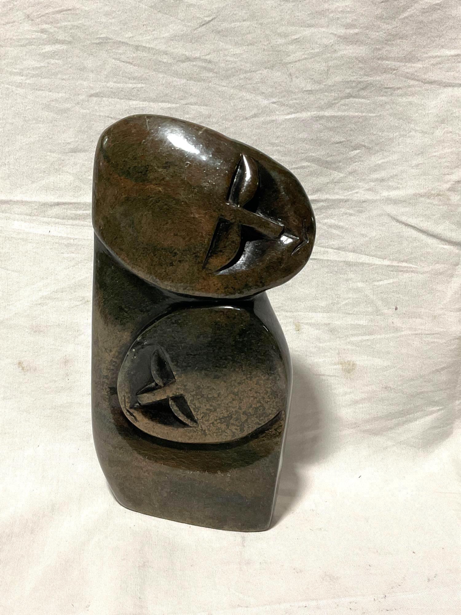 Hand Carved Multi colored African Stone Sculpture of Lovers resting Signed by Artist see pics