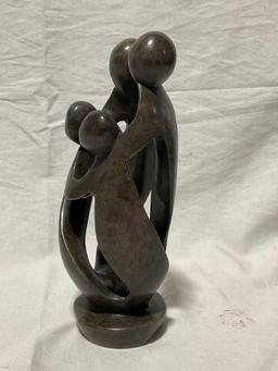 Hand Carved African Stone Sculpture of family , Man, woman, child embracing Signed by Artist