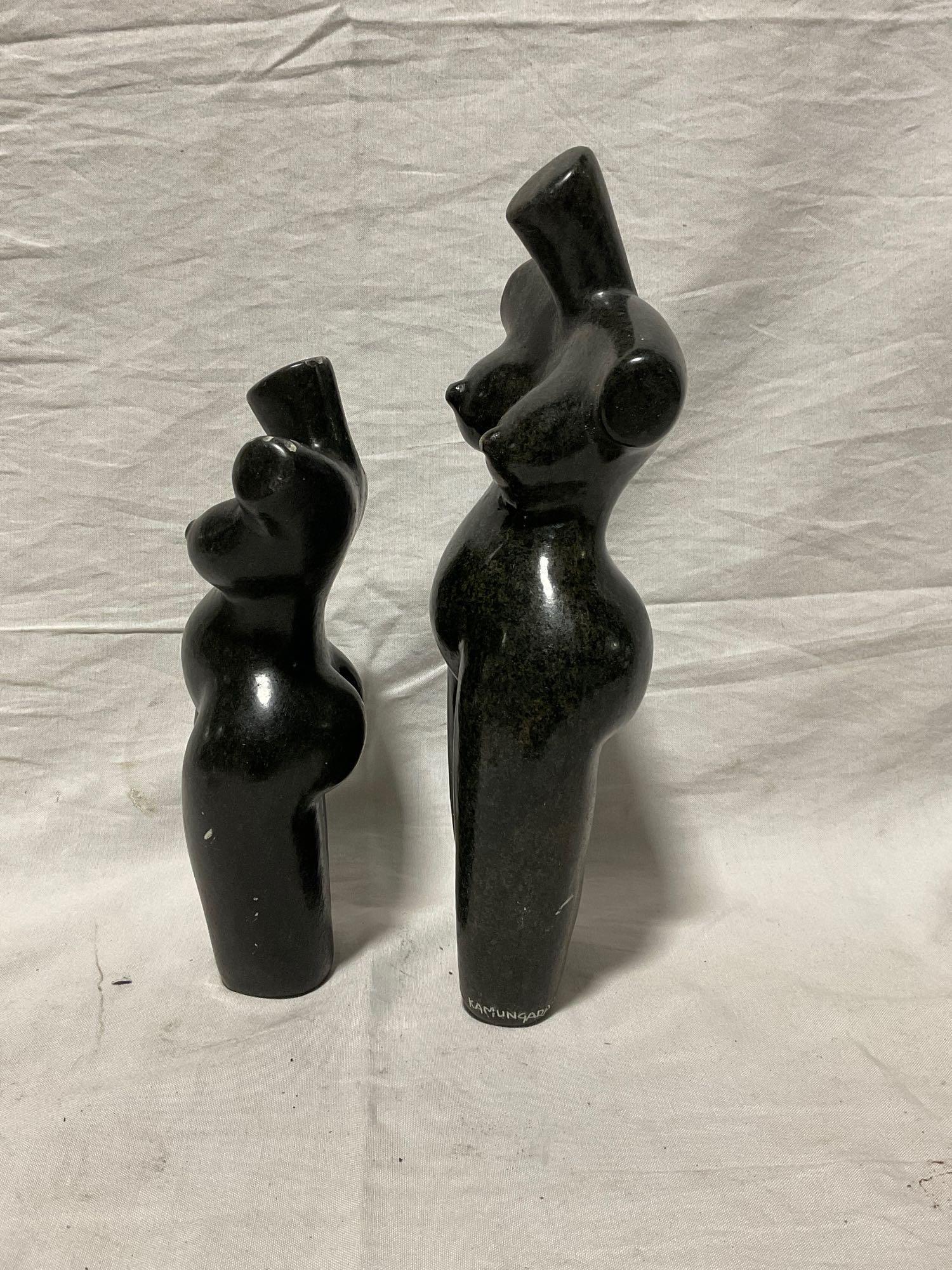 Pair of Hand Carved African Stone sculptures of different sized female torsos w/note from the artist