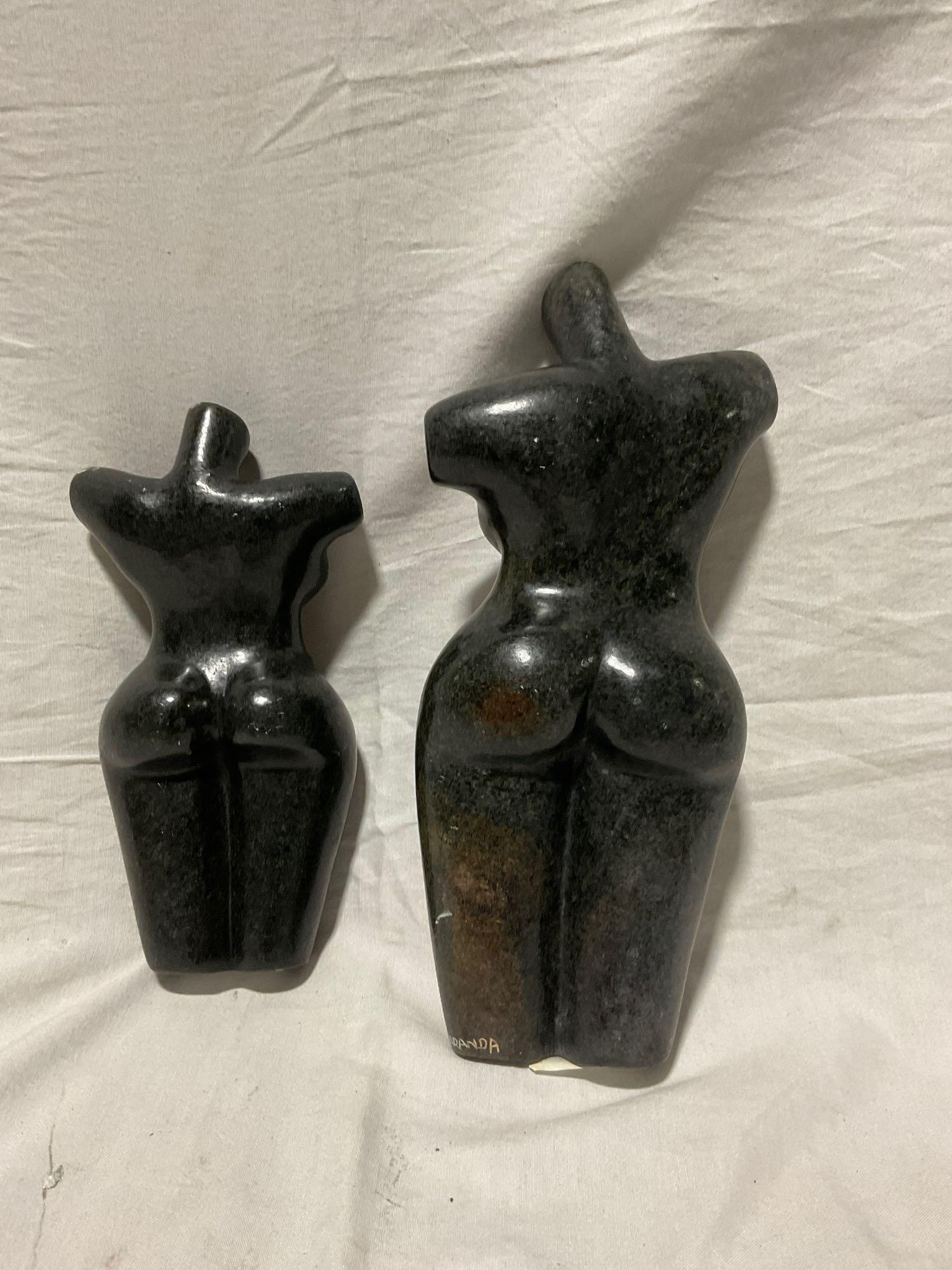 Pair of Hand Carved African Stone sculptures of different sized female torsos w/note from the artist