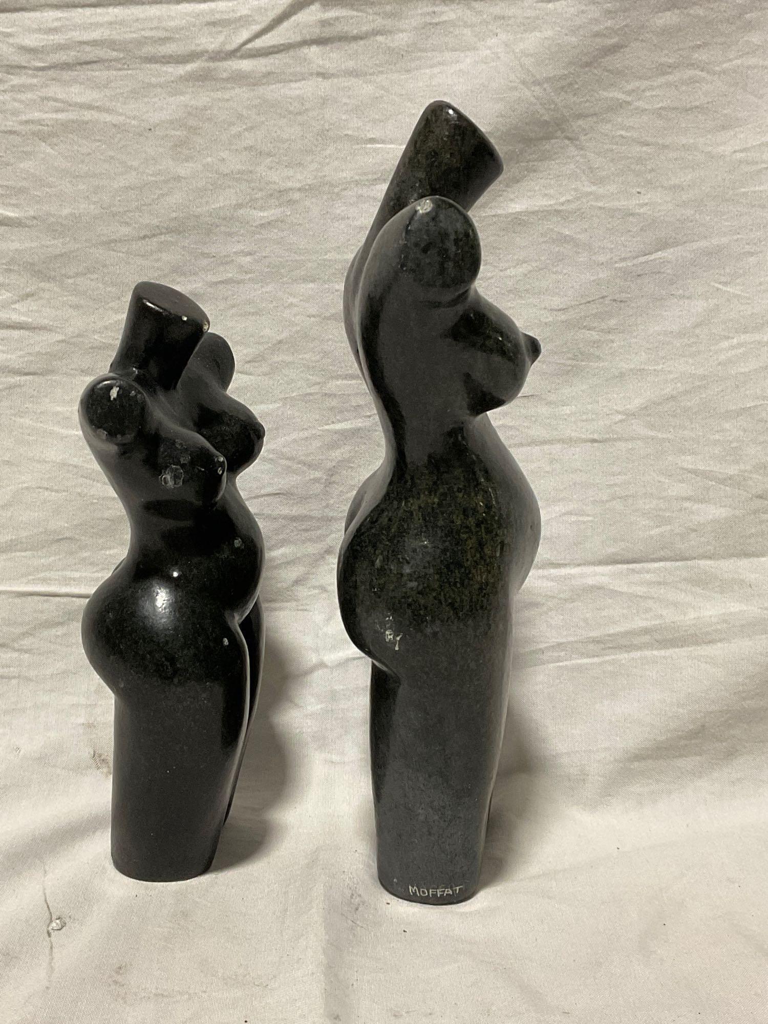 Pair of Hand Carved African Stone sculptures of different sized female torsos w/note from the artist